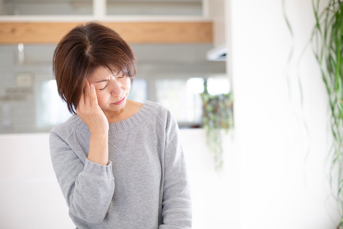 Japanese housewife suffering from migraine