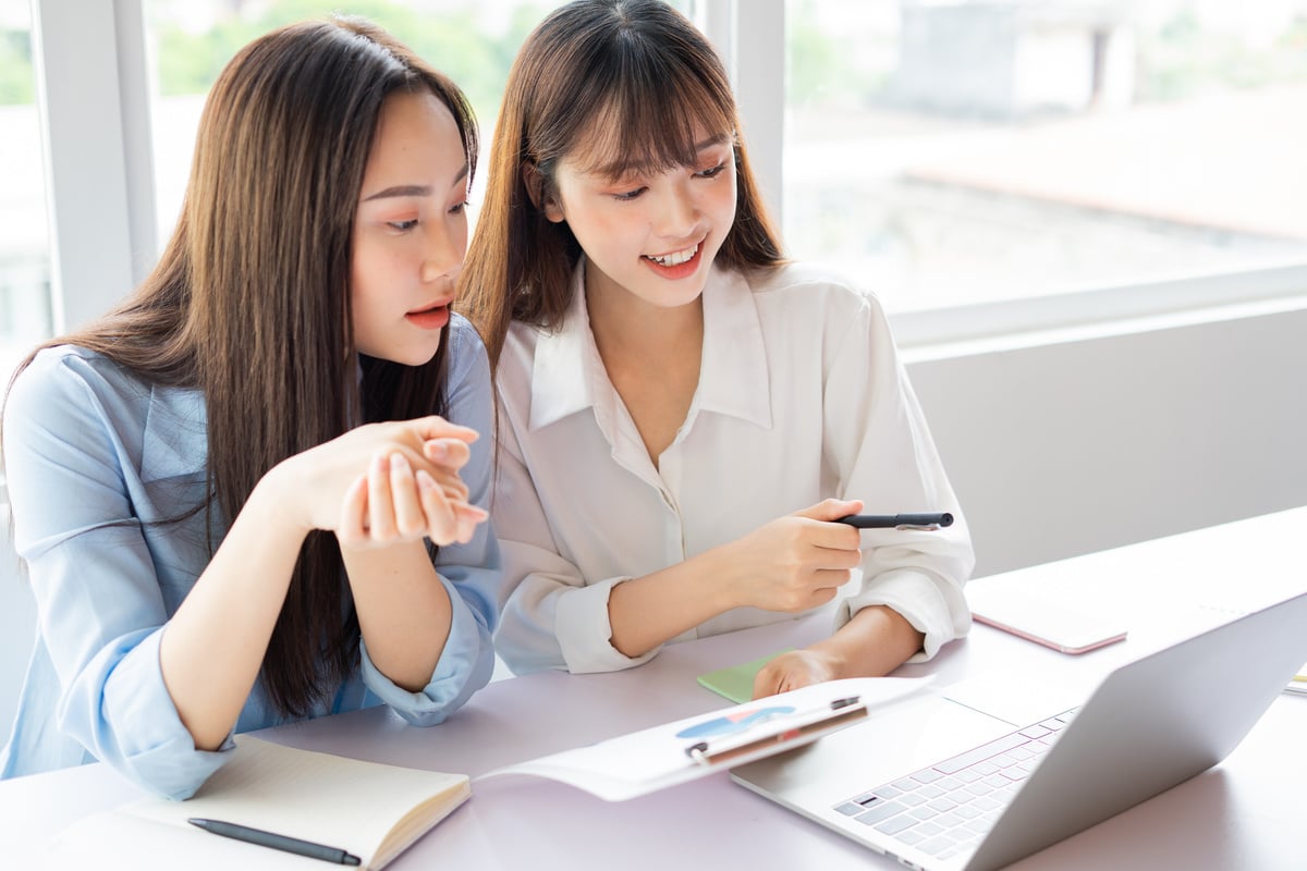 Colleagues Talking Over a Document 